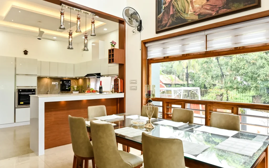 Dining area and kitchen open layout – Avanti Residence Thrissur